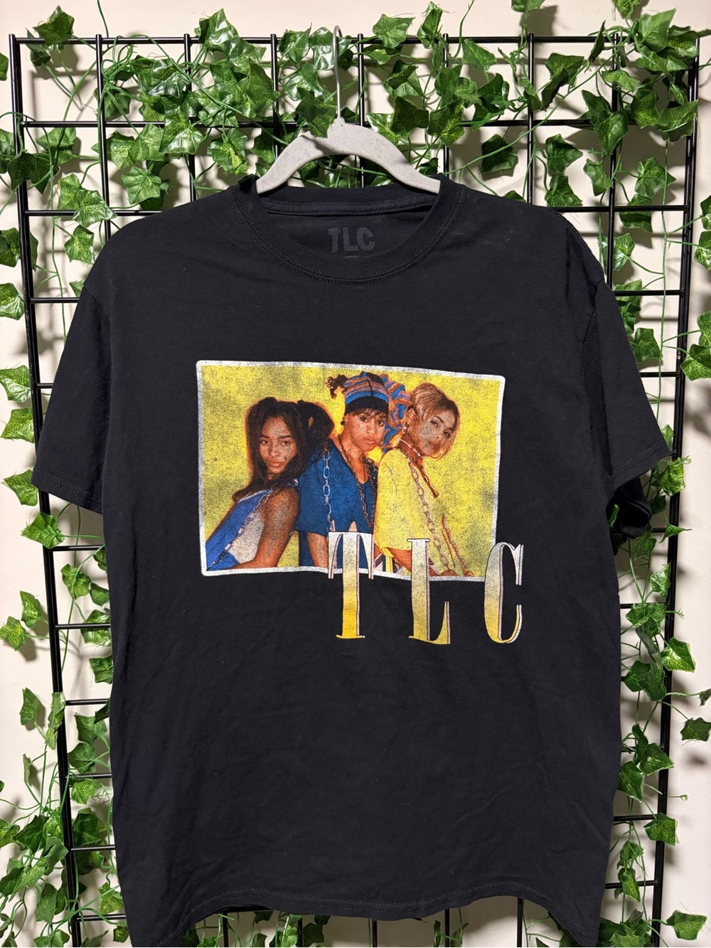 TLC Black Tee with Yellow & Blue Graphic